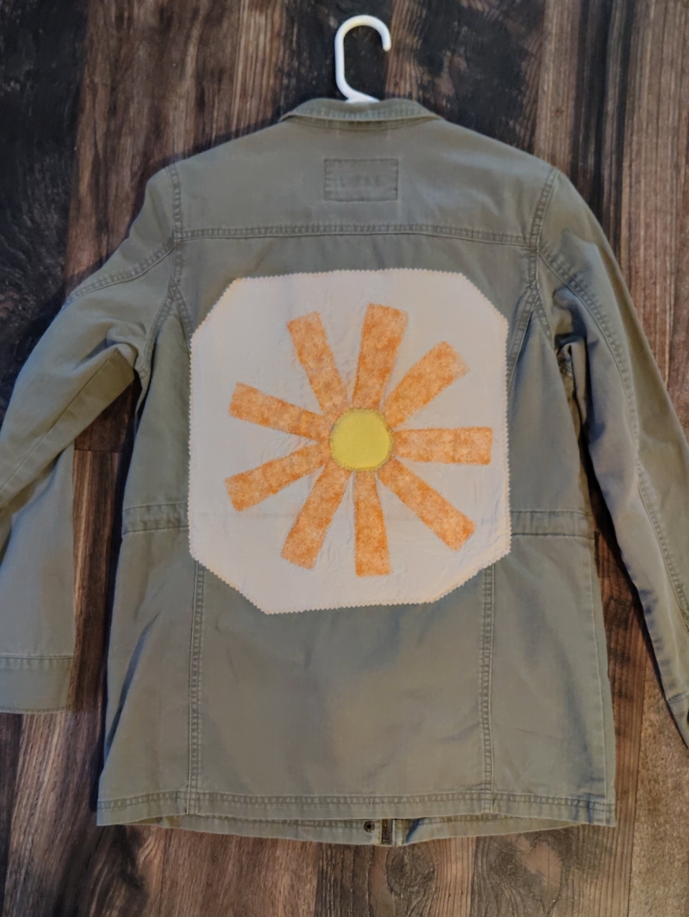 Merona Olive Green Jacket with Yellow Center and Orange Sunburst Patch